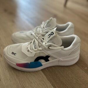 On Running White and Blue Athletic Shoes Performance Focused